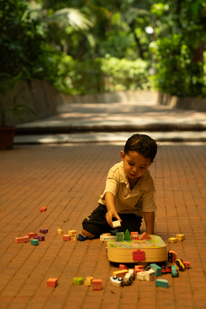 Wooden city building set for kids by TurtleBee featuring colorful blocks and miniature buildings for creative play.
