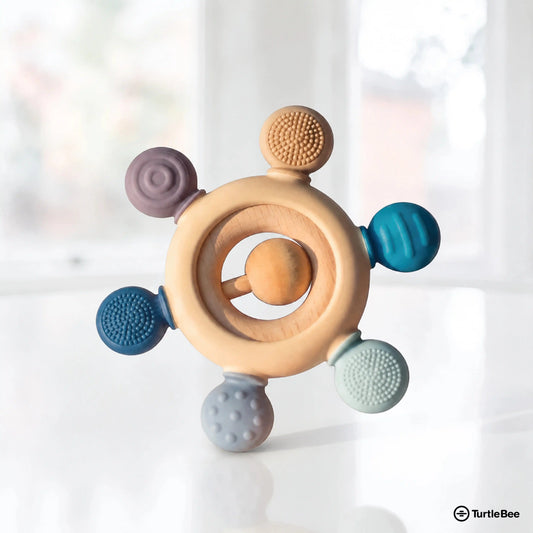 Silicone and wooden teether for infants aged 3-12 months, soft silicone beads and natural wooden elements for soothing gums.