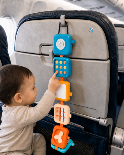 TurtleBee 2-in-1 TurtleBee Travelling Toy busy cube with colorful sensory and busy board features for children.